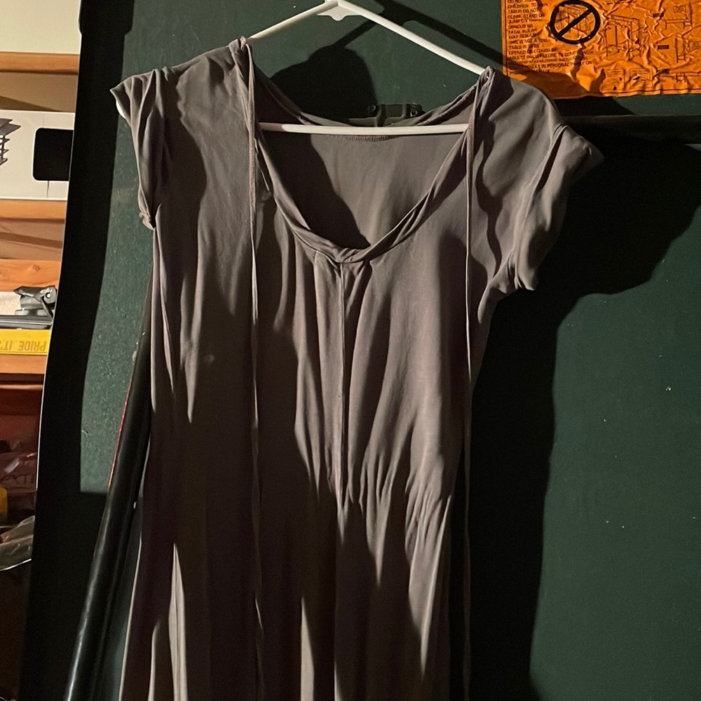 Dress is long folded sleeves